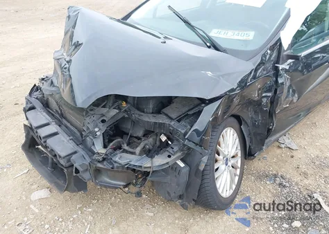 2014 Ford Focus Titanium z USA, uszkodzony, nr VIN 1FADP3N25EL194433